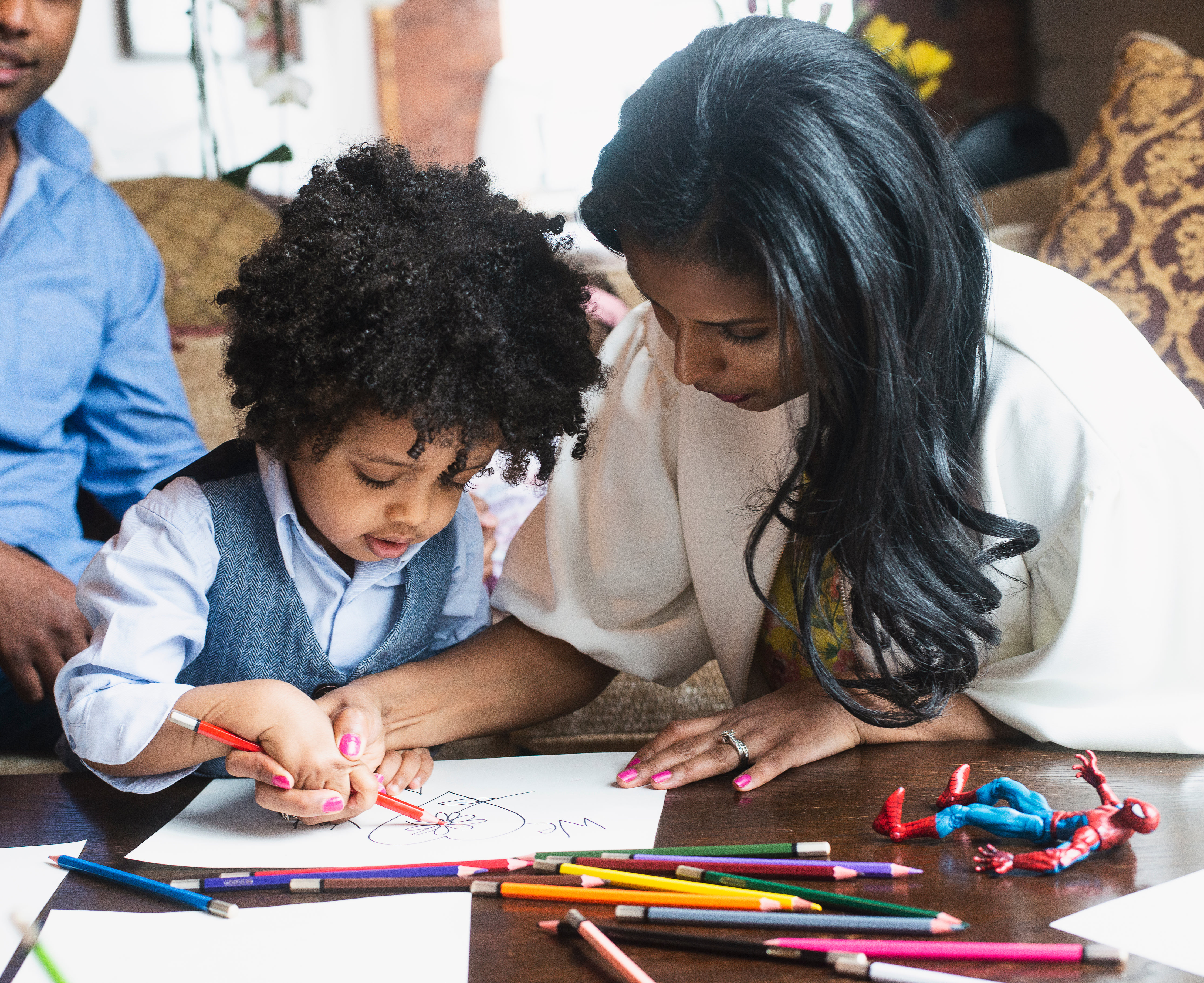 Image of mother and child drawing together